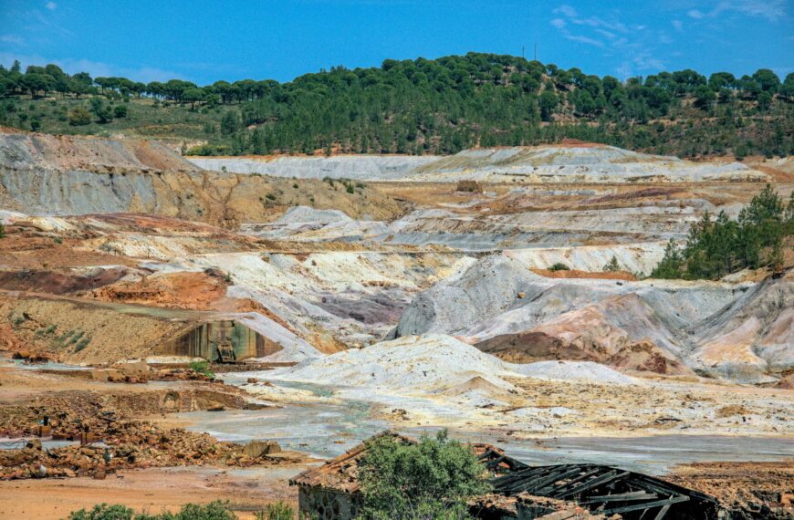 A vast industrial mining landscape in Minas de Riotinto, showcasing the earthy textures and mineral colors.